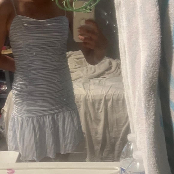 White and blue striped dress flared at the bottom. - Picture 2 of 3
